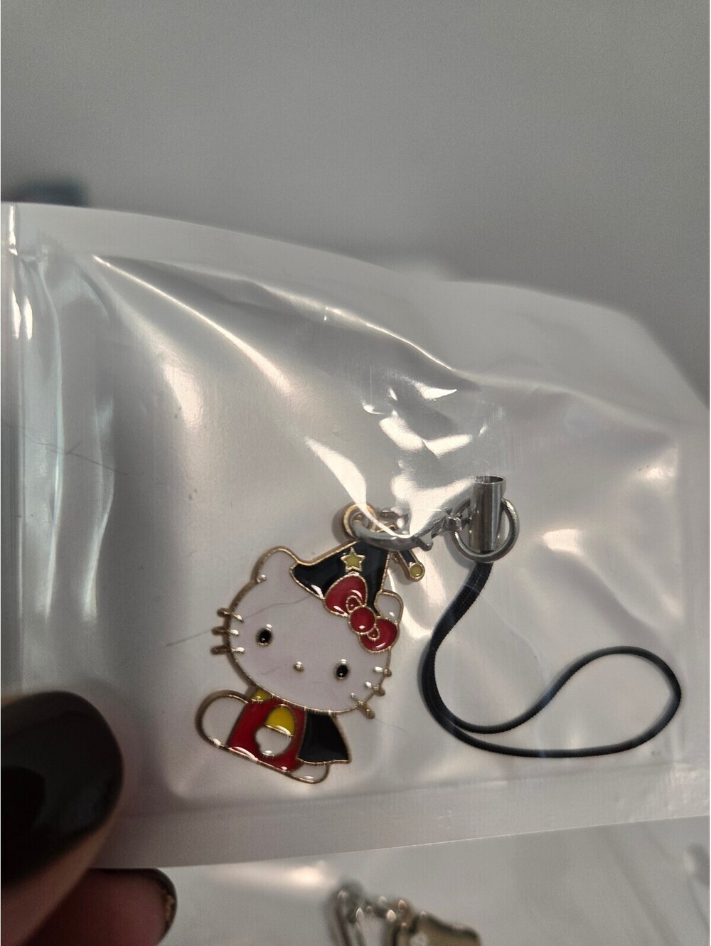 Hello Kitty red dress enamel phone charm